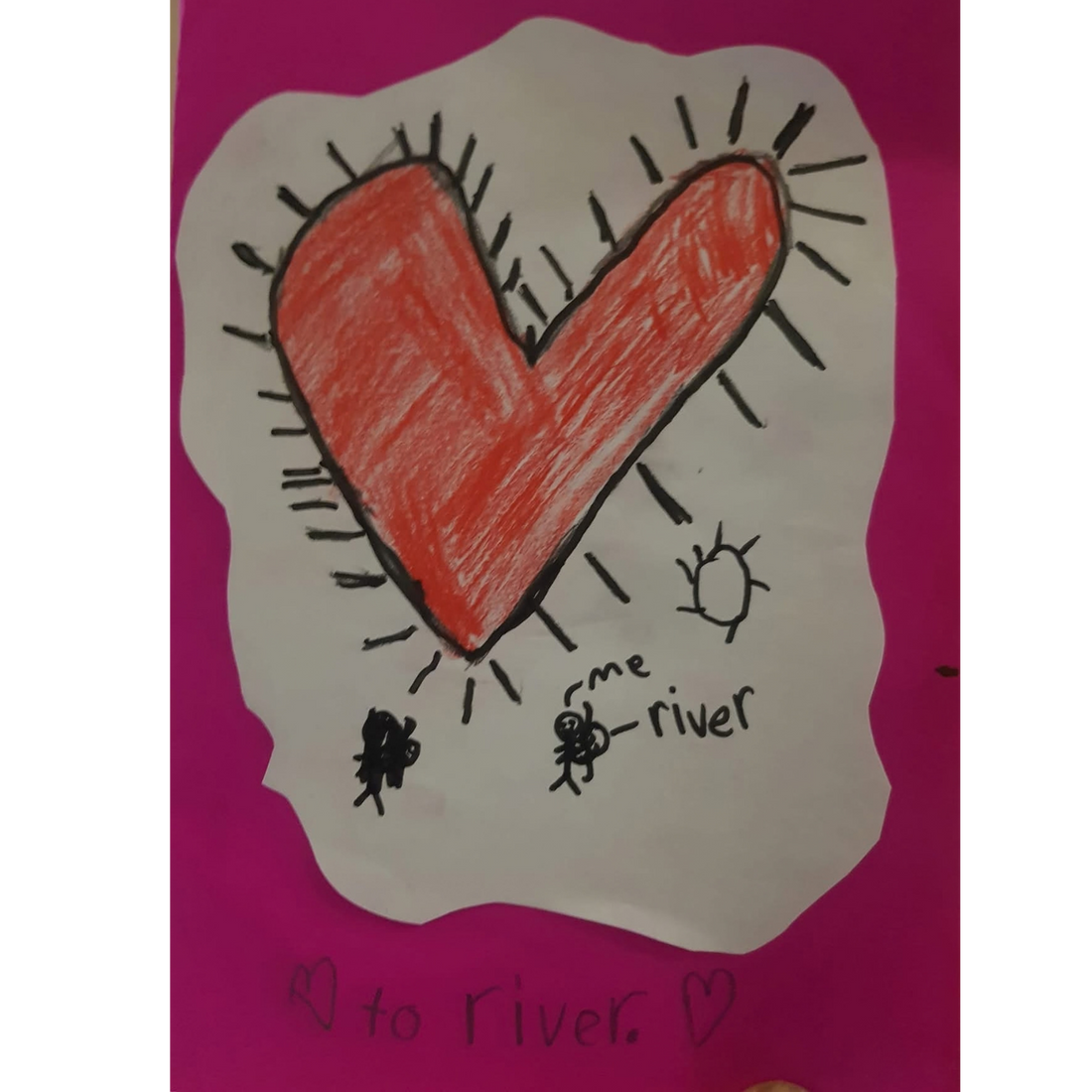 A handmade Valentine's card with a big red heart, made by a big brother for his baby brother
