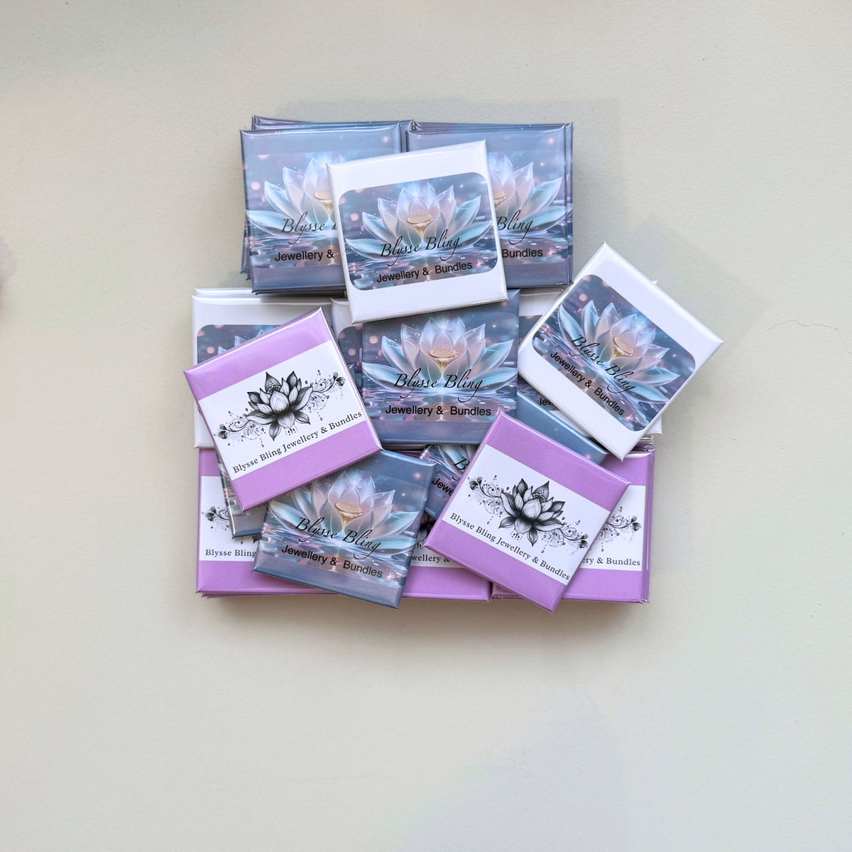 Flat lay of bulk custom branded magnets for Blysse Bling small business — personalised logo magnets handmade in Melbourne Australia